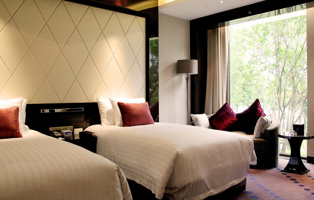 New Century Grand Hotel Nanxun Huzhou Rum bild