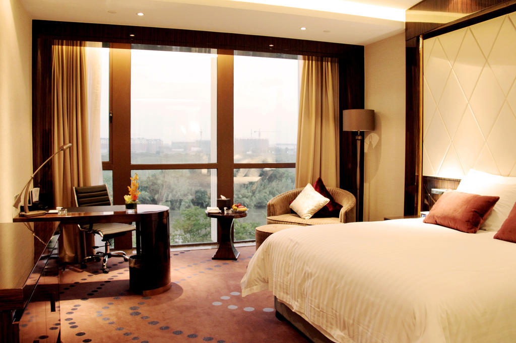New Century Grand Hotel Nanxun Huzhou Rum bild