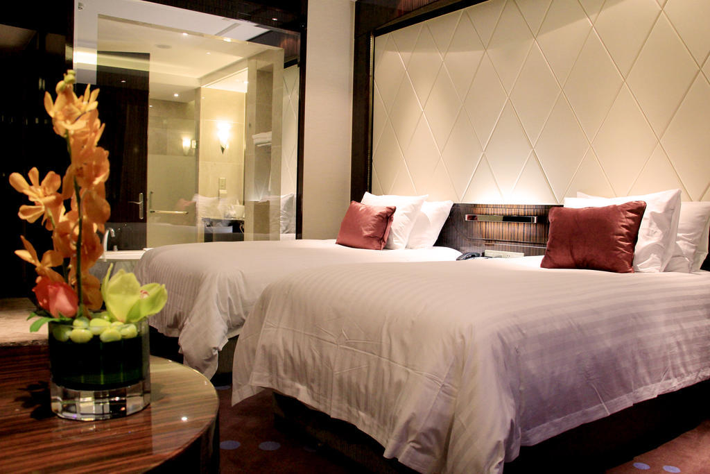 New Century Grand Hotel Nanxun Huzhou Rum bild