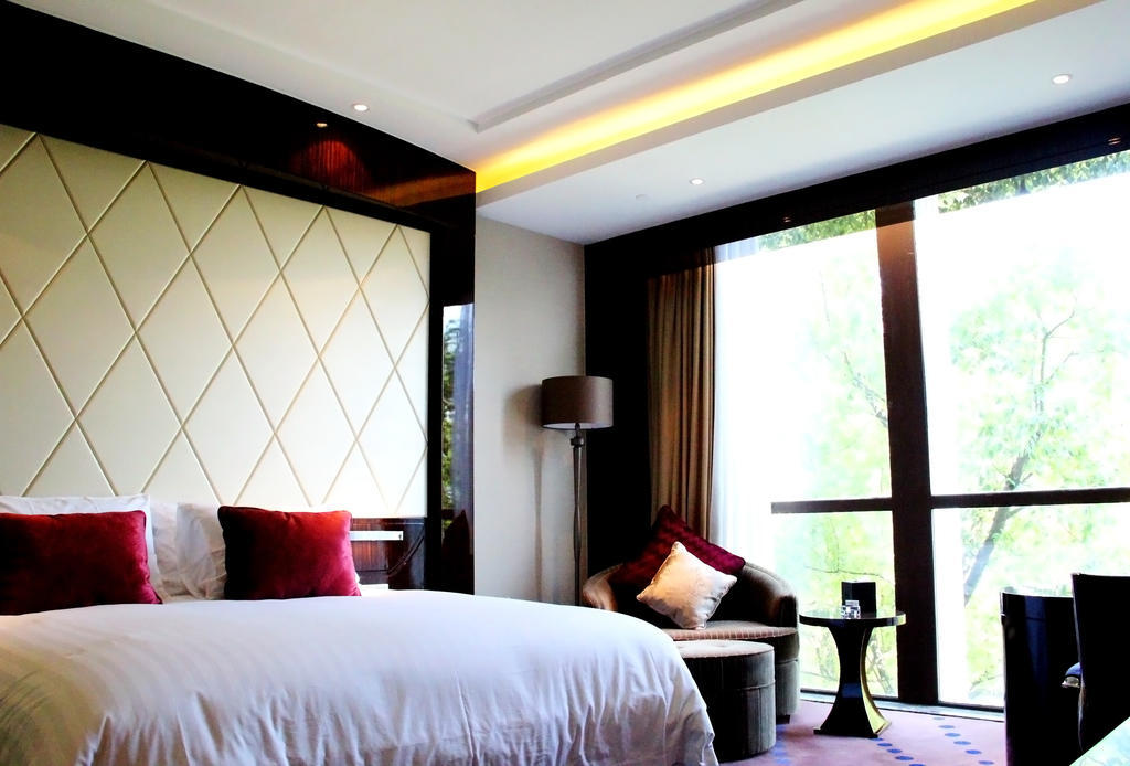 New Century Grand Hotel Nanxun Huzhou Rum bild